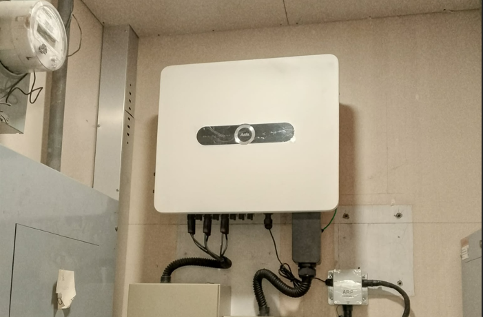 Wall-mounted string inverter installation for a rooftop solar system, Philippines